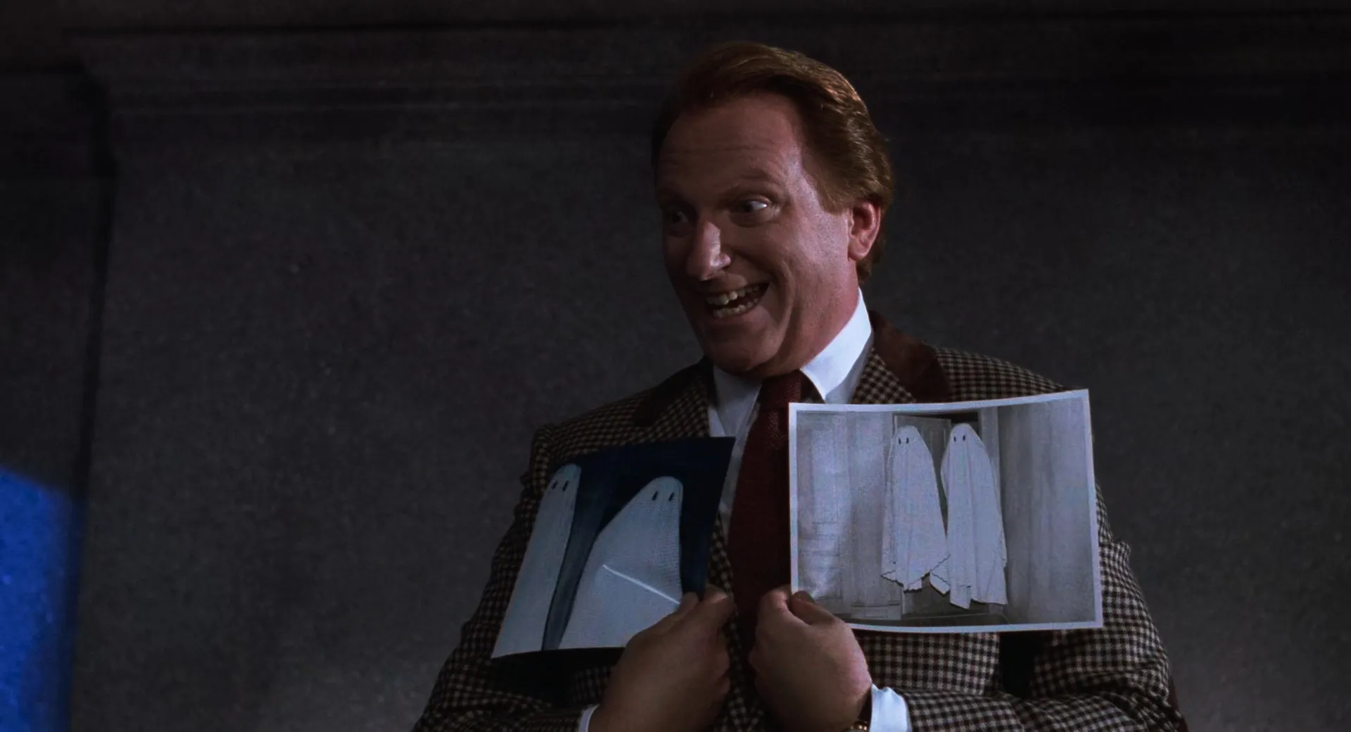 Beetlejuice - Charles holding ghost photo